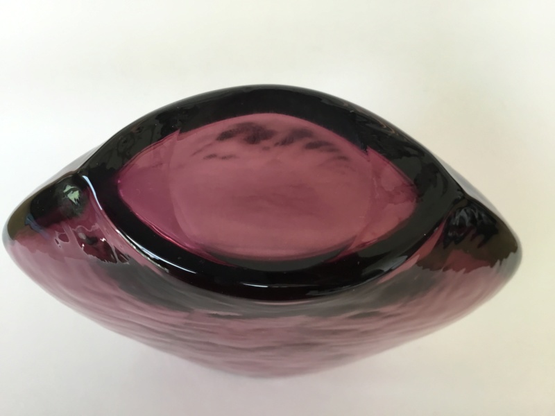 Flat, purple glass dimpled vase, ground hollow base 85a98510
