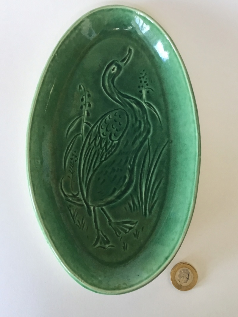 Oval green studio pottery dish incised duck  Eb67cd10