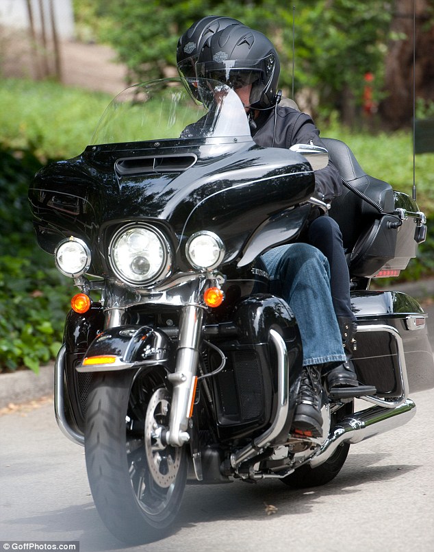 28 April 2014: George Clooney takes fiancée Amal Alamuddin for a romantic ride on the back of his motorcycle in LA Trip10