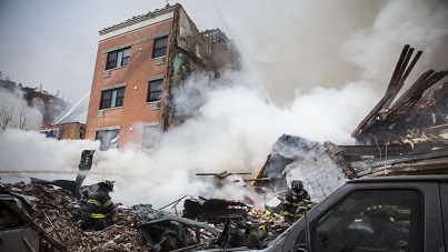 Grosse explosion à New York, au moins un immeuble s'effondre Pho4a010
