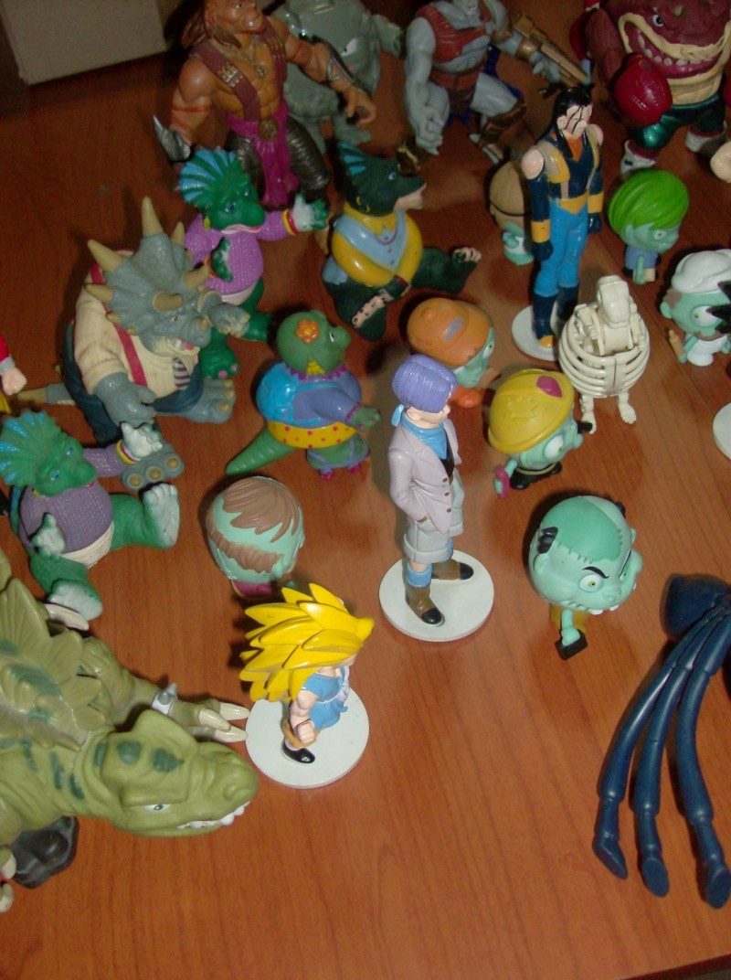 Lotto di oltre 40 Action figure varie anni 80 90 , Dragon Ball , Street Shark Dinosauri Dinosaurs Sinclair Disney ecc ecc ecc Hpim5749