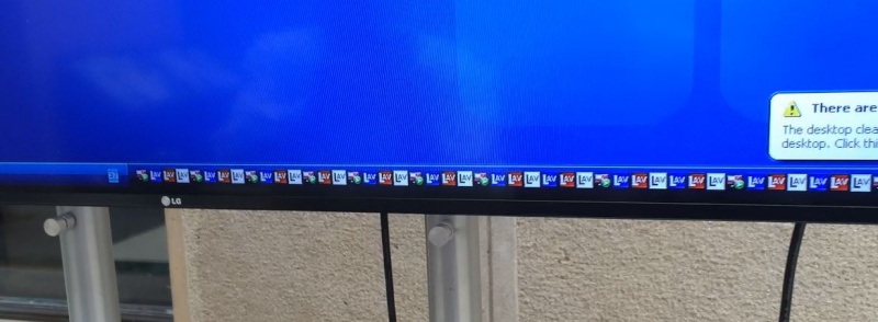 taskbar full with white,red and blue icons in your system tray (right-bottom of your screen). Icon11