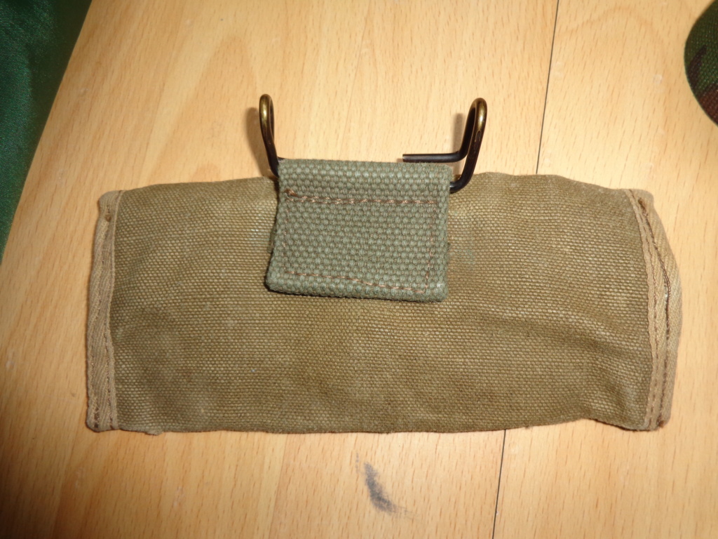 1 small pouch with belthooks, and a maybe British commercial DPM pouch? Dsc06851