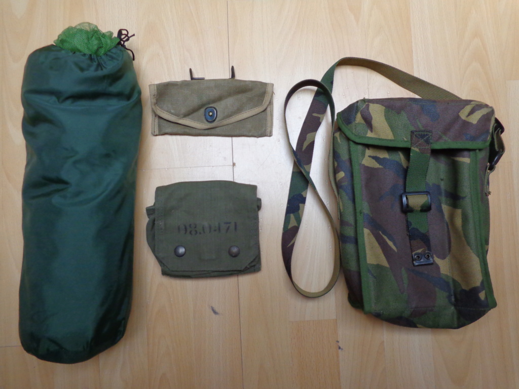 1 small pouch with belthooks, and a maybe British commercial DPM pouch? Dsc06853