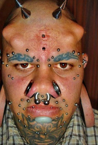 La vogue des tatouages et des piercings. - Page 4 Pt_210