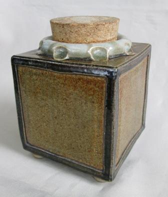 Cube with ball feet & cork is ade by Ian Webster Tea_ca11