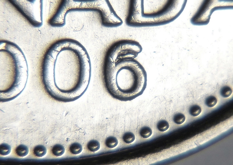 2006P - Éclat de Coin, "6" Partiellement Obstrué (Die Chip, Filled "6")  Ca_0_553