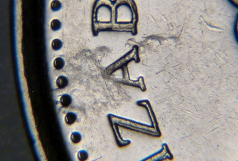 2007 - Coin décentré, Frappe à travers et doublure (Off center+Struck Trough+Double) Ca_0_601