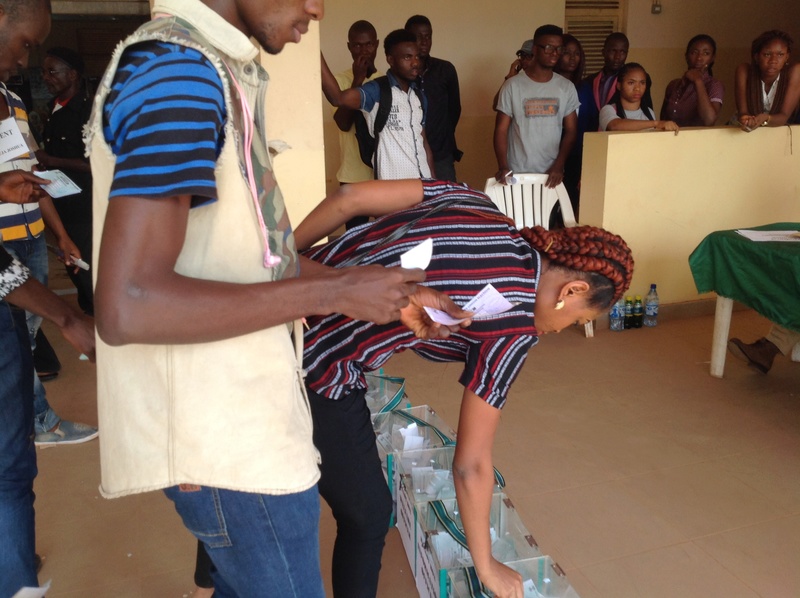 Watch pictures of CEO of campusvoice casting his vote during UNN SUG 2017 election Img_7926