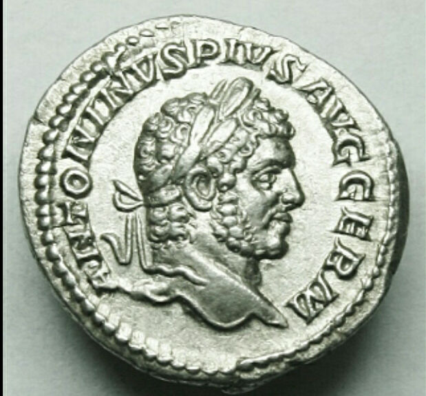 Denario de Caracalla. P M TR P XVII COS IIII P P. Apolo, sedente a izq. Ceca Roma. Captur27