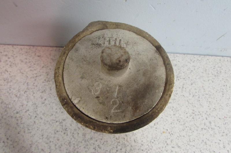 odd cement like measuring cup - Joseph Dixon Crucible Company, Jersey City  2014-112