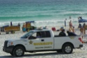 Deputy grabs Boogie board to help distressed swimmers Rescue10