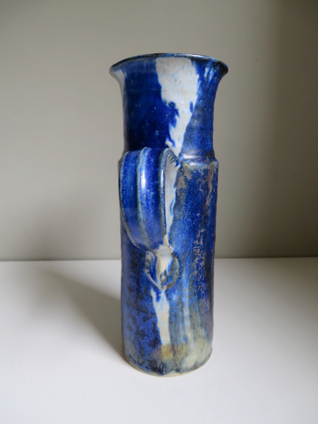 Tall jug with blue flambe like glaze - hand signed - hard to read! Img_0110