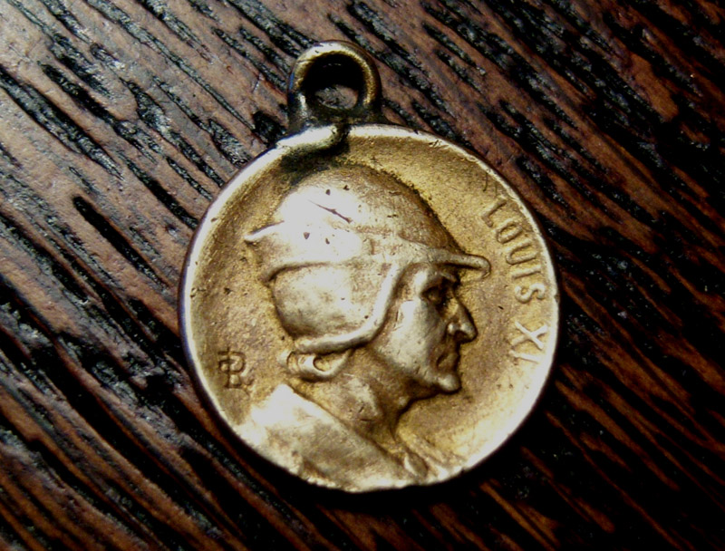 Une petite medaille Louis XI 148