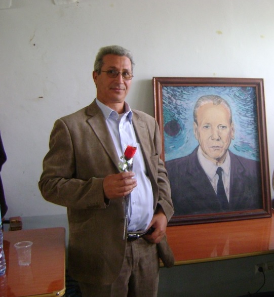 Kamel Bouamara avec le portrait de Rahmani Slimane à Aokas  11000