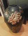 Any ideas who this vase is made by? 51696f10