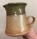 Unmarked salt glazed jug; distinctive ribbon handle  Fd5b0910