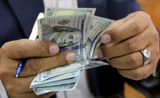 الدولار يواصل ارتفاعه و يقترب من حاجز الـ 18 جنية مرة اخرى 3722