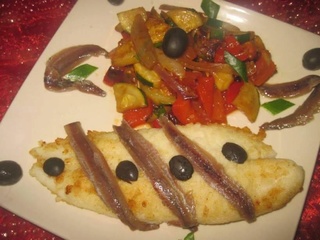 Filets de pangas aux légumes et anchois. 10470810