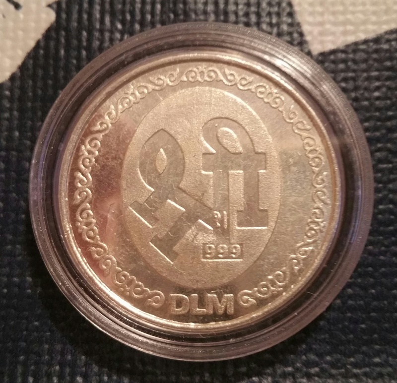 Ayuda con esta medalla 2018-011