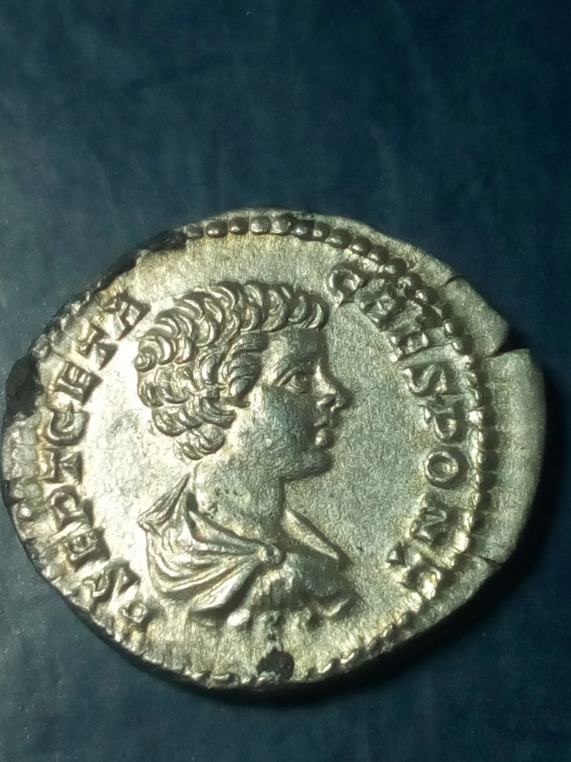 denario con manchas negras Img_2247
