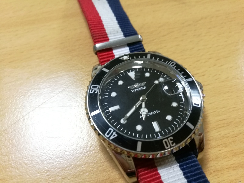 Revue Winner Divers Montre type Chinoiserie par excellence