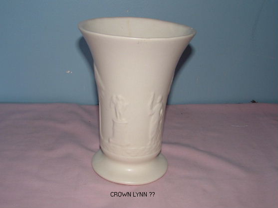 Vase with figurines on it ....? Crown_30