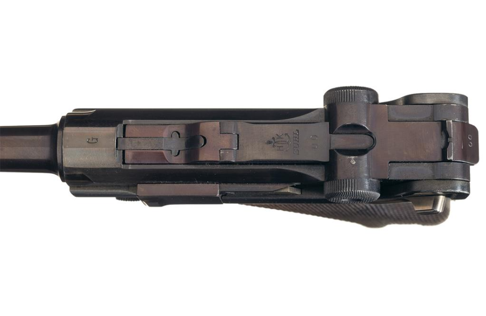 Un pistolet Luger de la Luftwaffe fabriqué par Krieghoff. - Page 2 Code_110