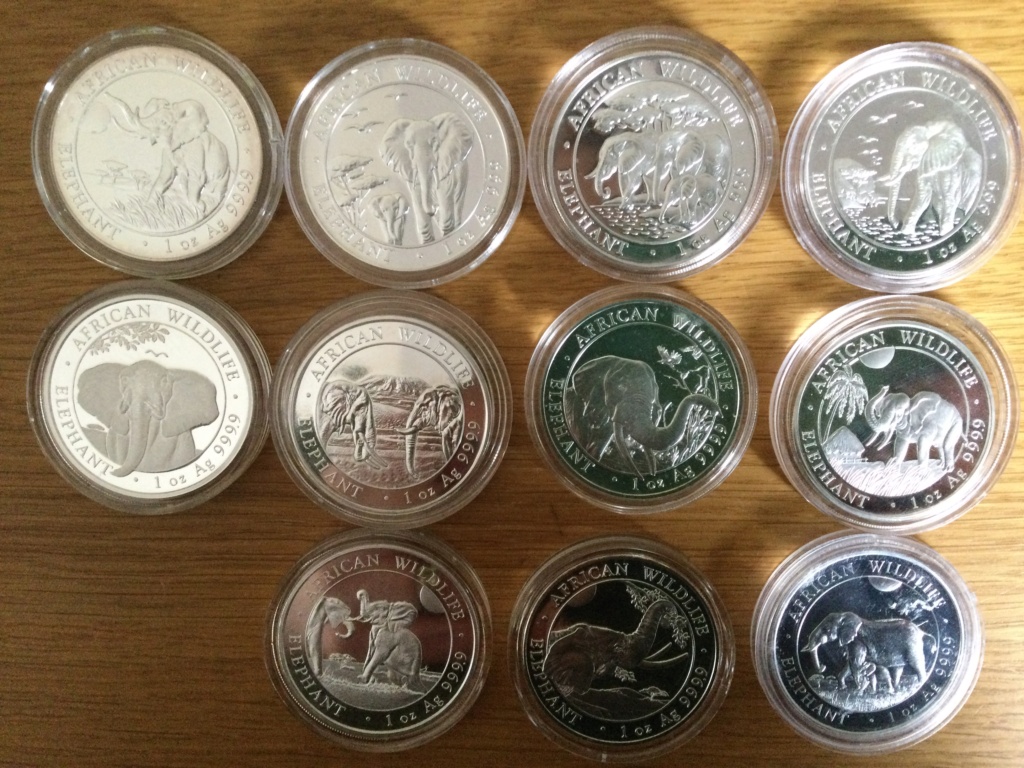 A herd of elephant coins 59708610