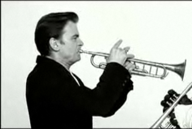 Clovis donne un cours de trompette Trompe12