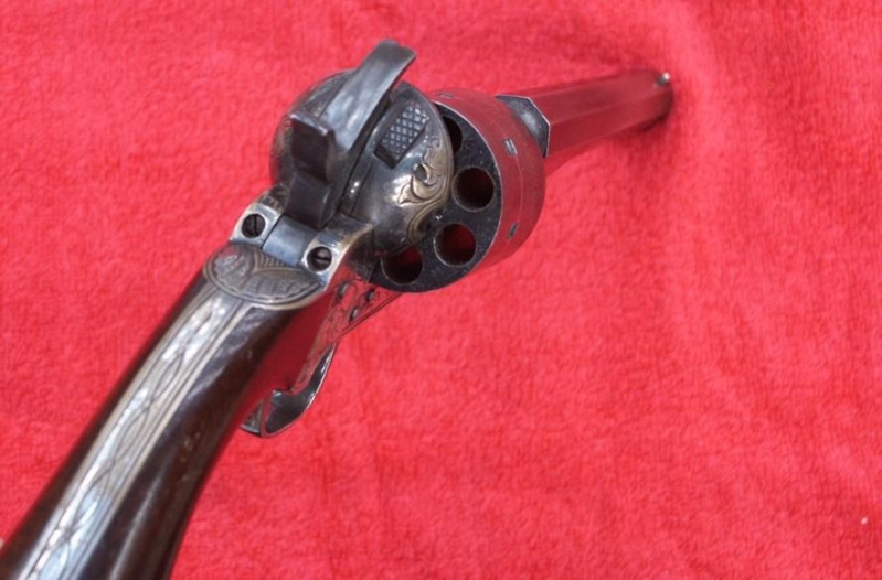 Revolver D. Moore 1860 à barillet basculant et teat-fire Moore212
