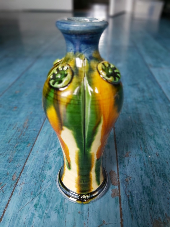 Does anybody know the maker of this drip ware bottle vase? 20230529