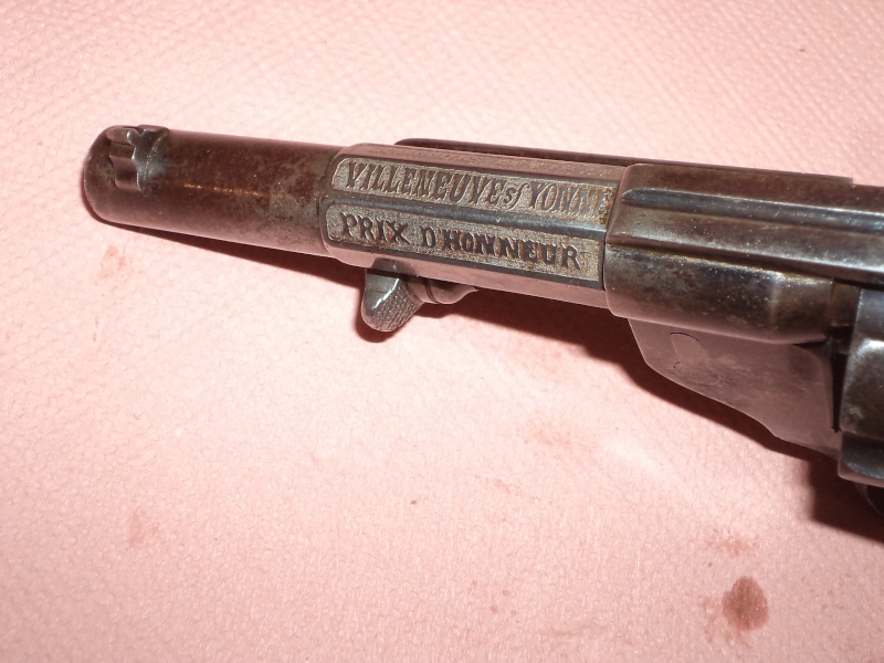 Qui, pour me renseigner sur ce revolver civil 1874 ! 1873 ! Prix de tirs Dsc05418