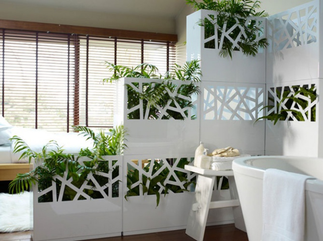 Comment aménager son salon avec la porte d'entrée qui y arrive directement??? Separa11