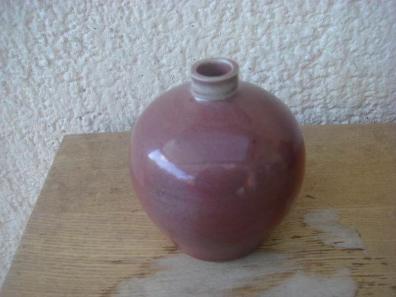 Any ideas on this pinkie/red glazed little brown vase..odd mark Copied51