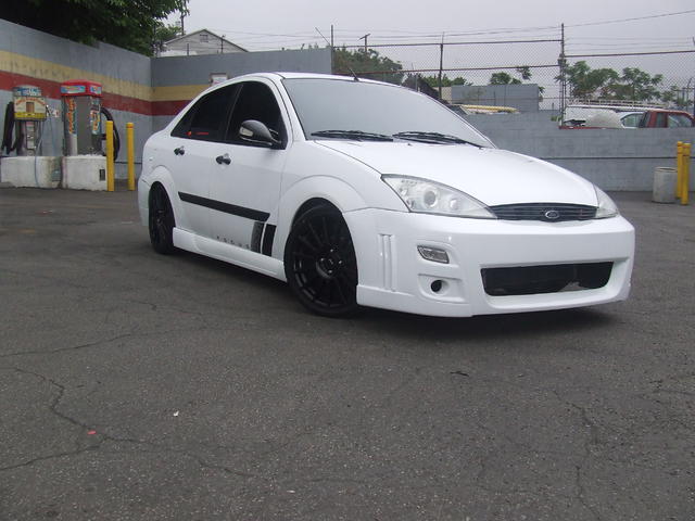im thinking 05-07 white sedan but with 00-04 front end swap  White_10