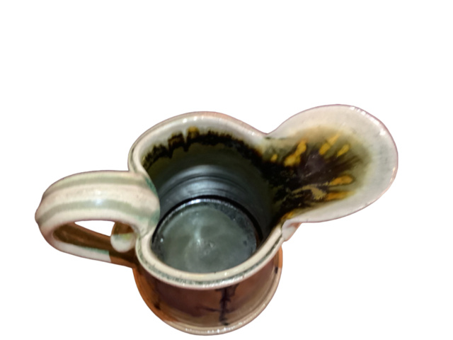 Help Identify “F” pottery stamp on white clay salt glaze drip pitcher Img_3213