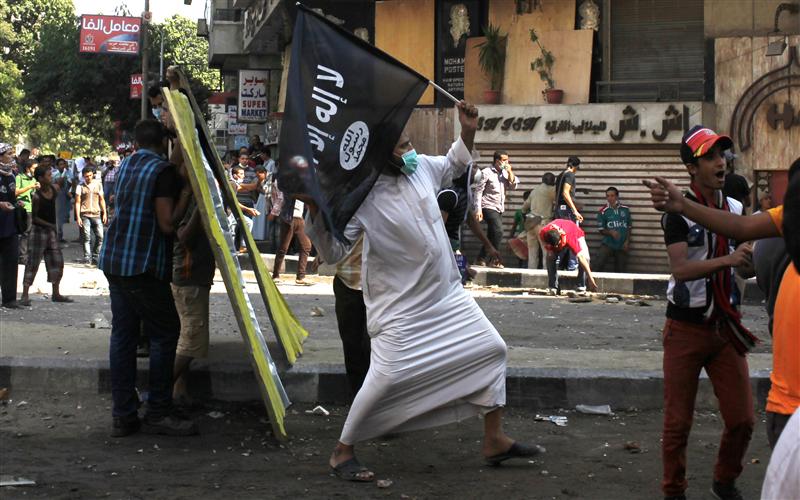 قتيل و18 مصابا في اشتباكات بين أنصار مرسي والأهالي بالزقازيق 31cb2810