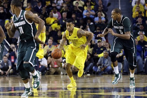 #4 U-M holds on to beat #9 Michigan State 58-57.POSTGAME YOUTUBE UNDER: CURRICH5 U-m11