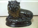 Figural Lion With Crossed Paws Photo411