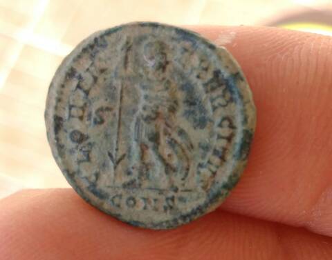 Moneda romana limpiada con Dremel.
