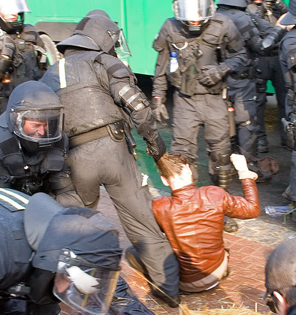 woman violently arrested by thug jack-boots at Syria protest... 2b881910