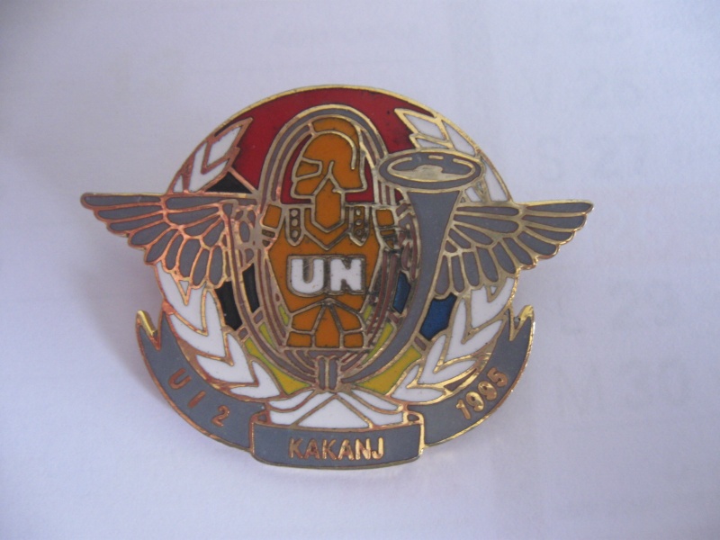 Qui pourra identifier cet insigne ONU ? Onu_ka10