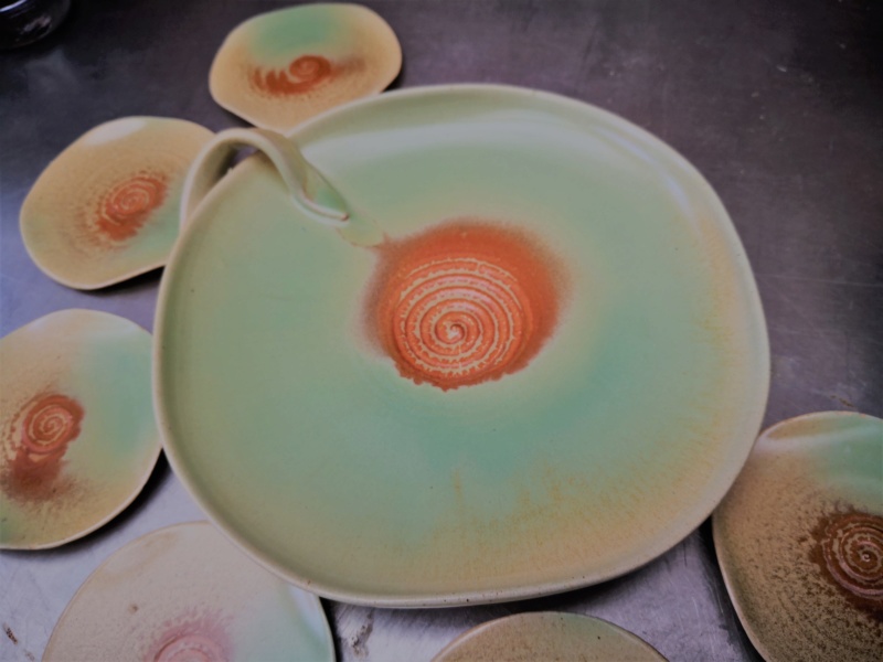 art pottery plate with handle and small plates, no makers mark Img_2015