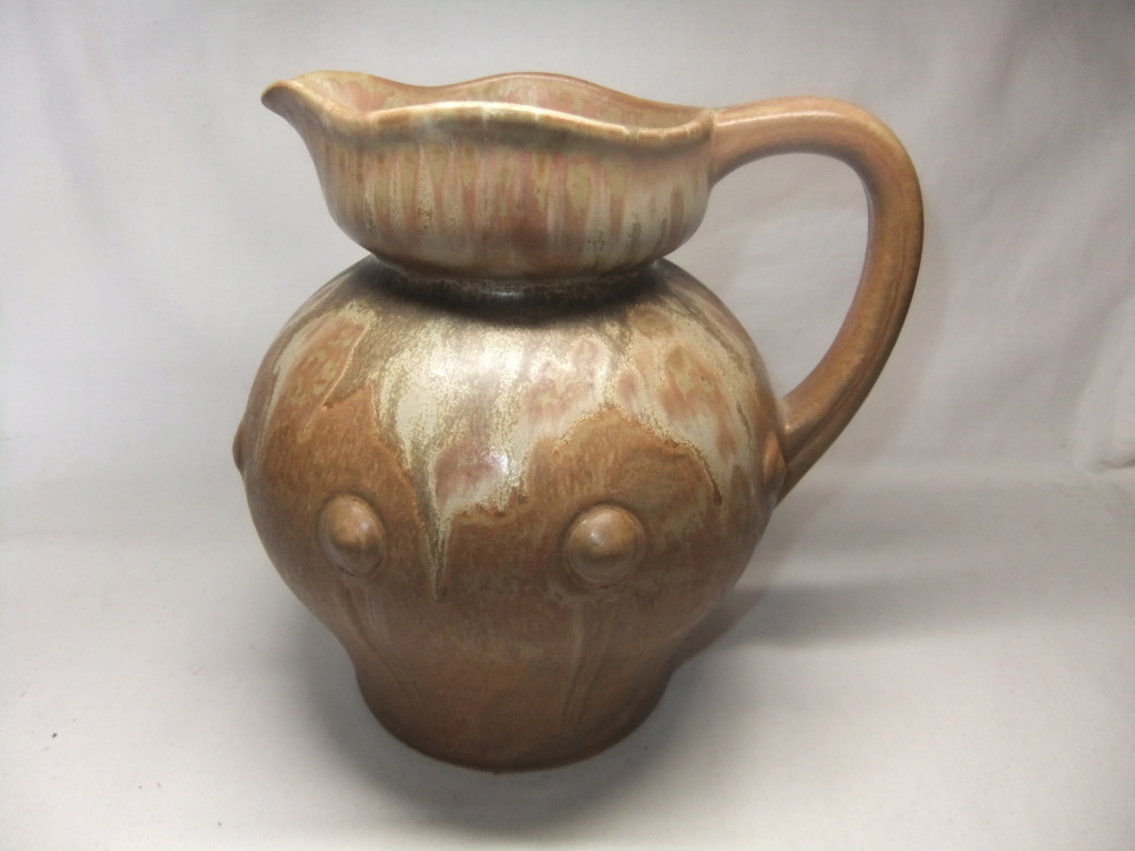 Anyone recognize the maker of this Jug? Sadly the writing has been rubbed Dscf4246