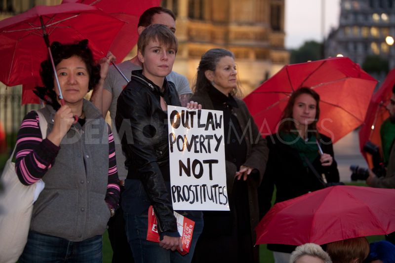 Sex workers demonstrate for rights to work without fear of arrest. Protesters marched with red umbrellas. London, UK, 13th October 2011 1610