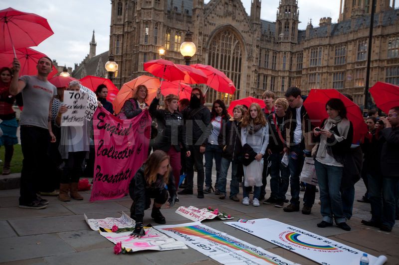 Sex workers demonstrate for rights to work without fear of arrest. Protesters marched with red umbrellas. London, UK, 13th October 2011 1710