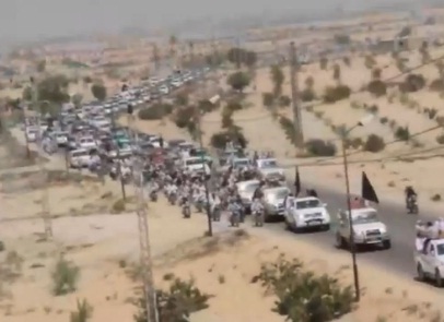 بالفيديو :  الآلاف يشيعون شهداء القصف الصهيوني بسيناء Masr10