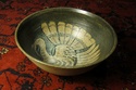 Stoneware bowl with Turkey, H mark and incised JC mark 110