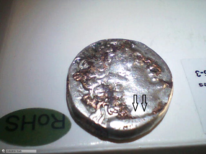 Etrange métal fondu sur monnaie argent Pictur20
